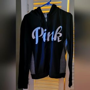 Hooded zip up sweatshirt.